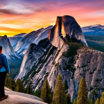 **Image Prompt:** A serene landscape of Yosemite National Park at sunset. Towering granite cliffs and giant sequoia trees are silhouetted against a vibrant sky. In the foreground, a lone hiker stands peacefully, gazing at the scene, completely absorbed in nature, with no phone in sight. The overall mood should be one of tranquility and awe.